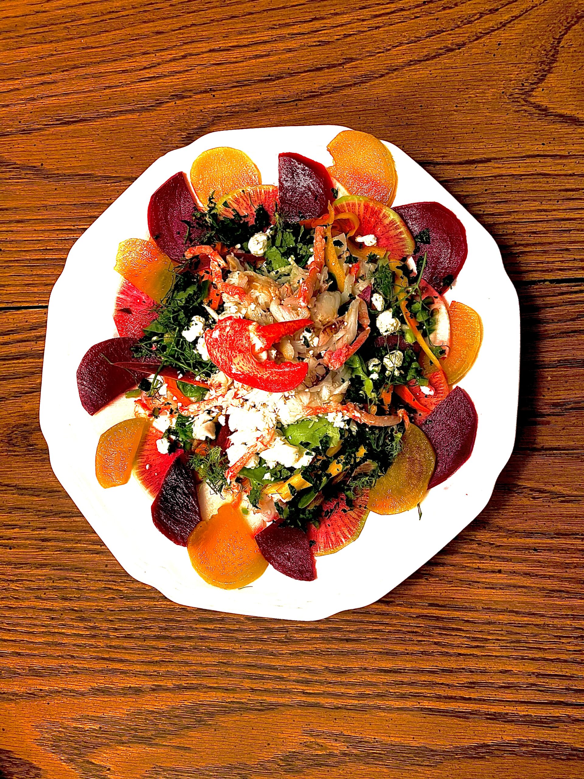 Dungeness crab and root vegetable salad with beets, watermelon radish, goat cheese, and lobster